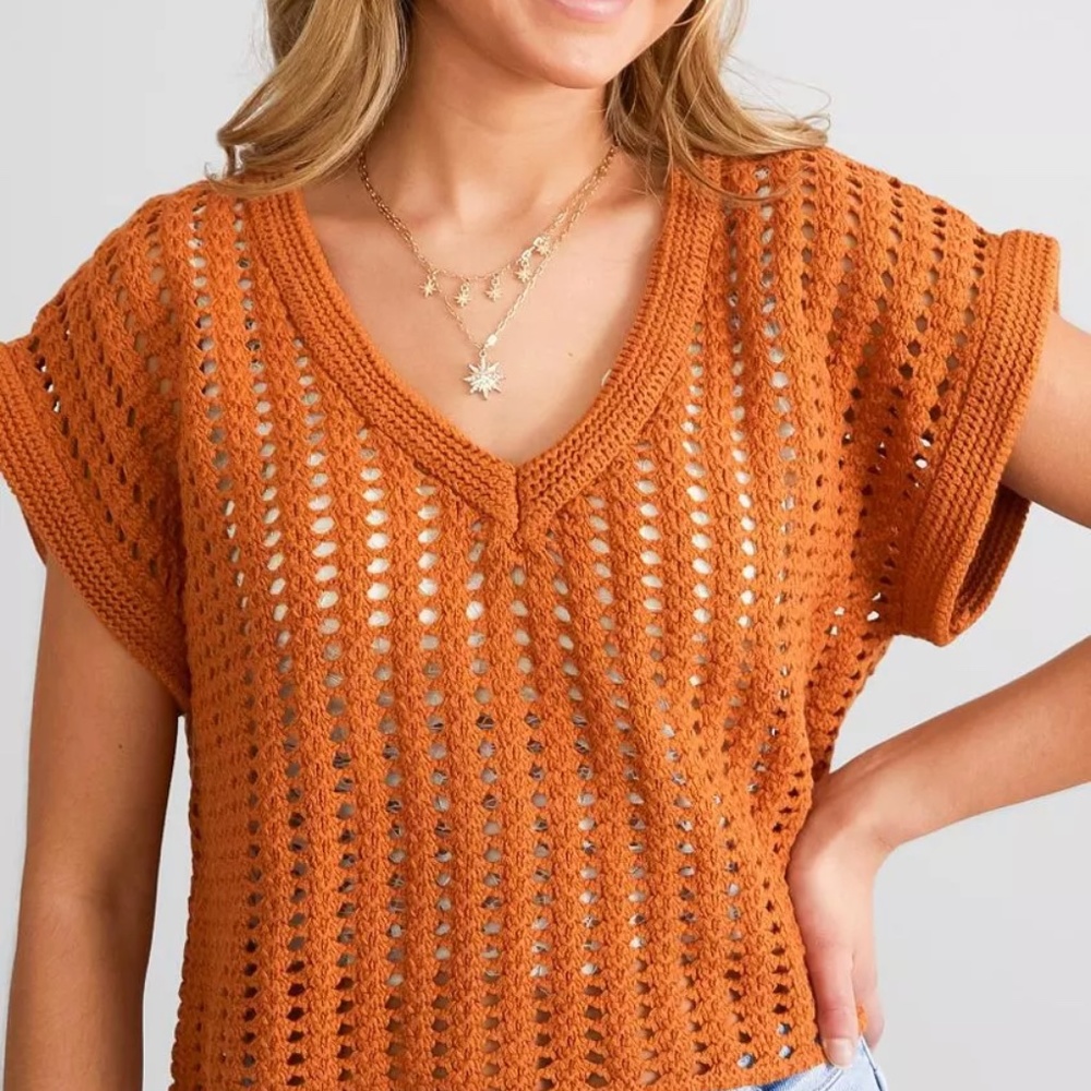 Orange knit top